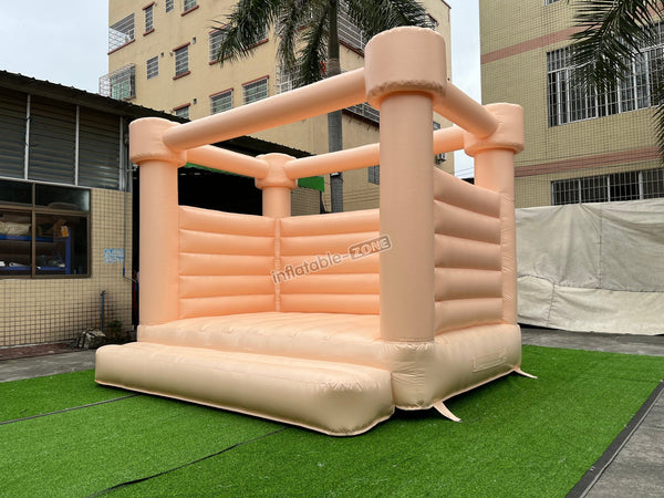 Pastel Peach Wedding Bounce House Castle