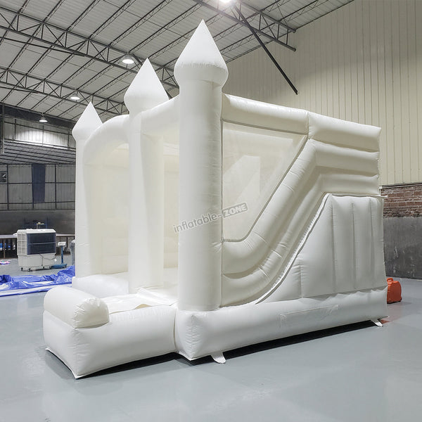 White bounce house with slide for wedding/party